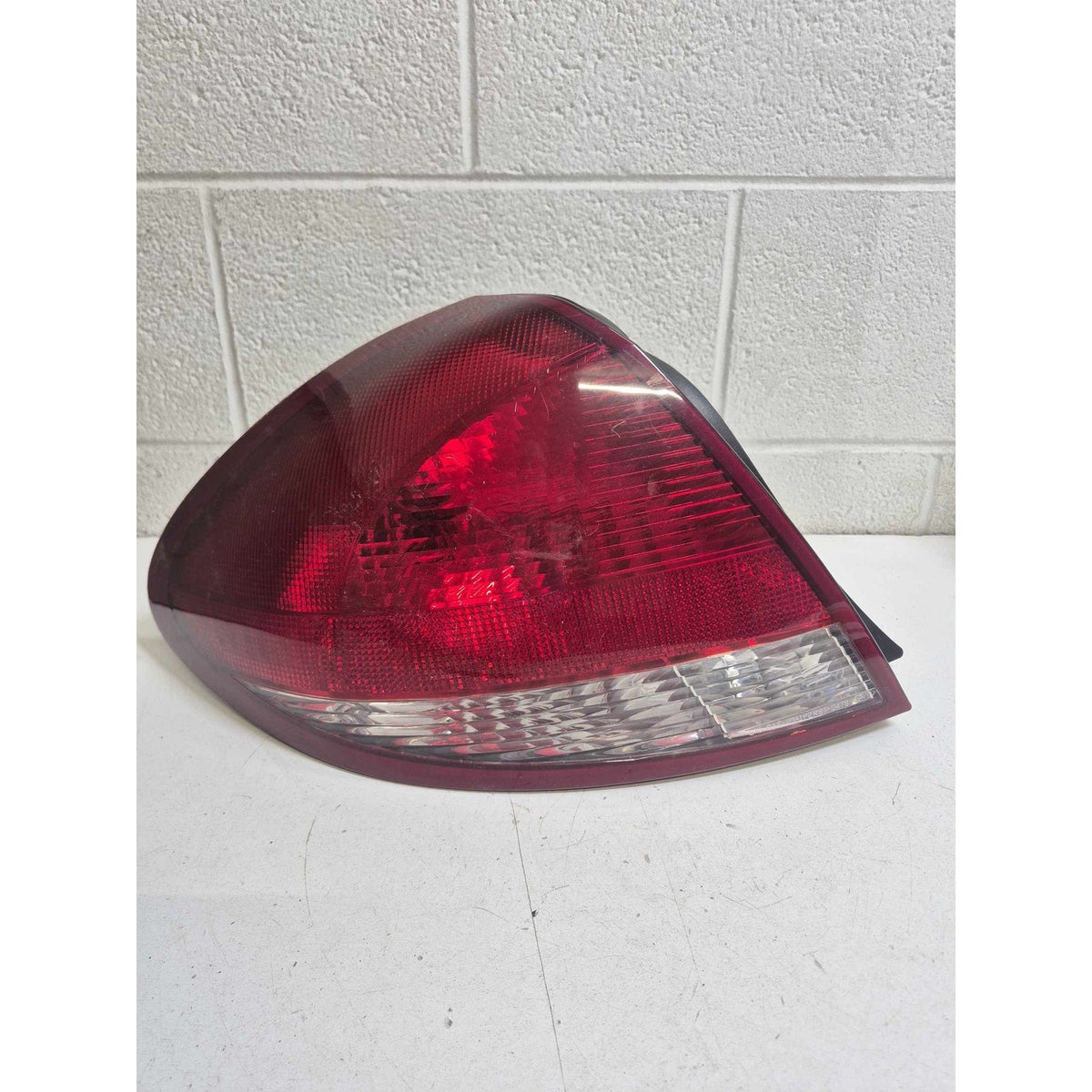 Used Tail Light Assembly FORD TAURUS Left 04 05 06 07 - photo 1